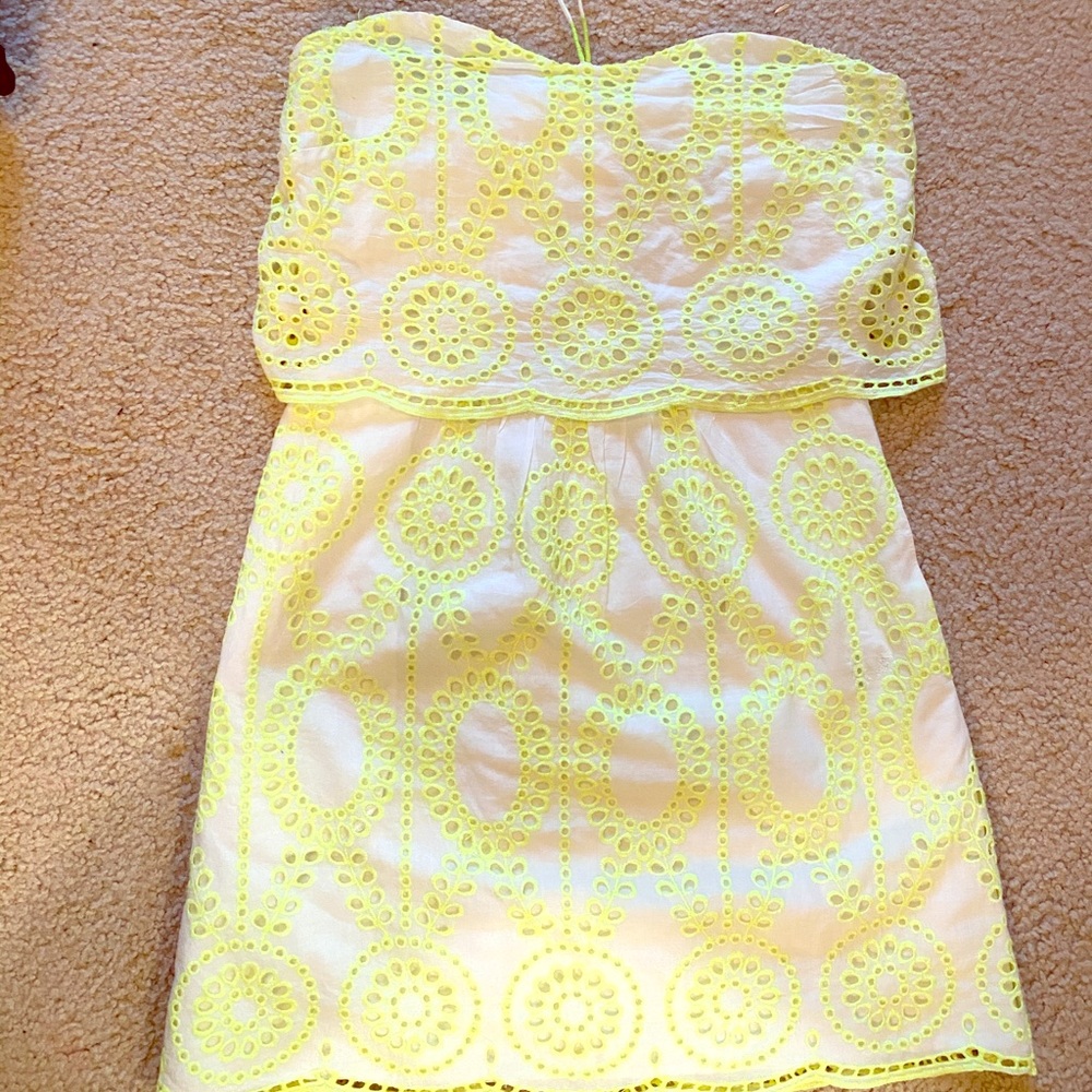 White Eyelet sundress with like green accents